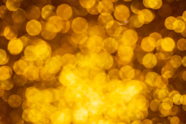 Golden lights abstract bokeh background. Chrismas lights bokeh. - Zdjęcie, obraz