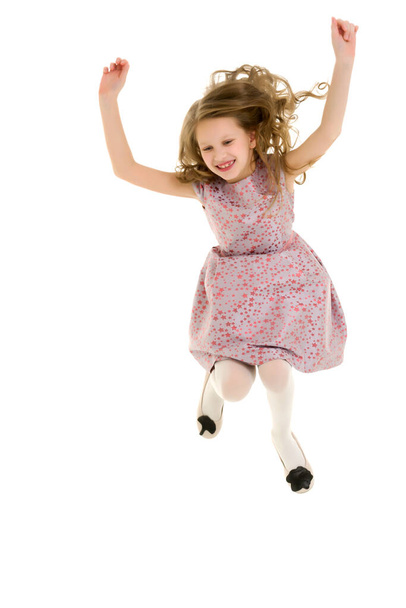 Beautiful Blonde Girl Happily Jumping with Raising Hands - Foto, Imagem