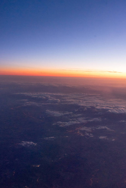 Europa, Nederland, een zonsondergang boven een watermassa - Foto, afbeelding
