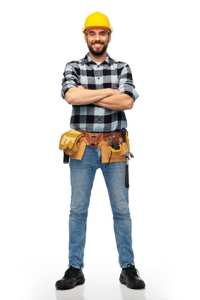 happy male worker or builder with crossed arms - Zdjęcie, obraz