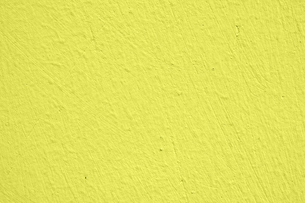 Κίτρινη υφή τοίχου ή χαρτιού, αφηρημένο φόντο επιφάνειας τσιμέντου, μοτίβο σκυροδέματος, ζωγραφισμένο τσιμέντο, ιδέες γραφιστική σχεδίαση για web design ή banner - Φωτογραφία, εικόνα