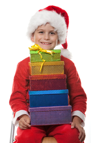 Boy holding a christmas gift - Φωτογραφία, εικόνα