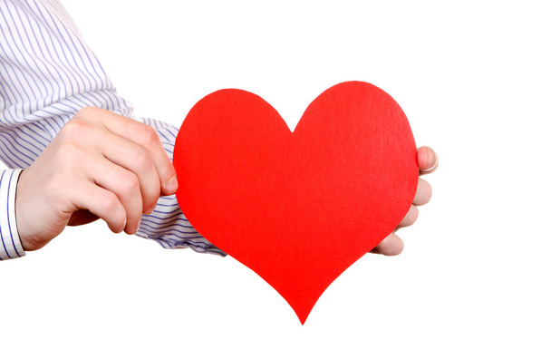 Person holds Red Heart shape - Foto, Imagen