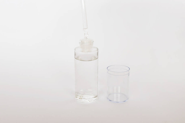 Dropper glass Bottle Mock-Up. osmetic pipette on white background - Photo, Image