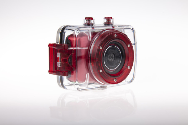 Câmera de vídeo de ação vermelha subaquática com caixa impermeável de plástico
 - Foto, Imagem