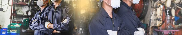 Travailleurs industriels portant des masques en uniforme et croisant les bras dans une usine métallurgique. - Photo, image