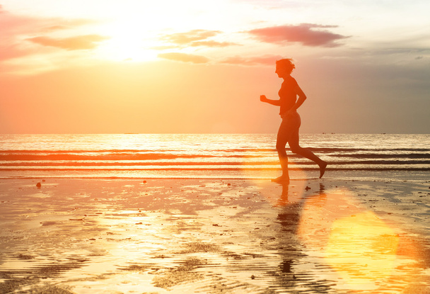 Silhouette of woman jogger - Zdjęcie, obraz