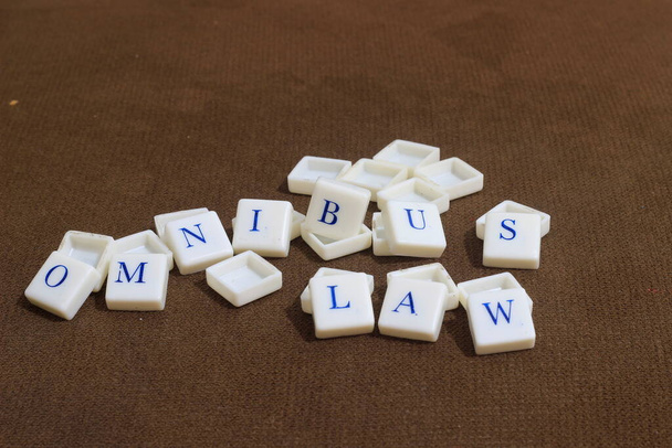 Illustration Photo for Omnibus Law, Blue Alphabet at Plastic Cube - Фото, зображення