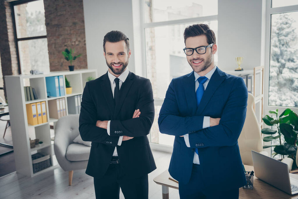 Portrait of two nice content imposing classy experienced cheerful cheery men expert specialist employer economist top director folded arms at industrial loft light white interior work place station - Valokuva, kuva