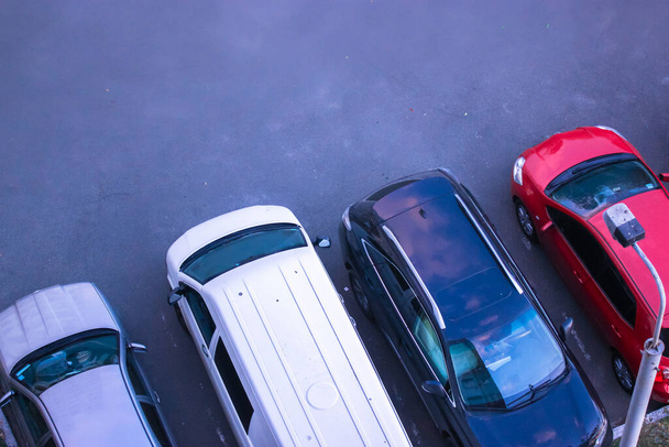 Car sedan roofs in the parking lot, view from above - Photo, Image