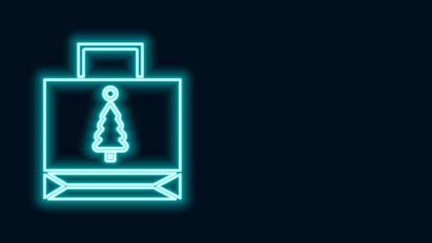 Ragyogó neon vonal karácsonyi papír bevásárló táska ikon elszigetelt fekete háttér. Csomag jel. Boldog karácsonyt és boldog új évet! 4K Videó mozgás grafikus animáció - Felvétel, videó