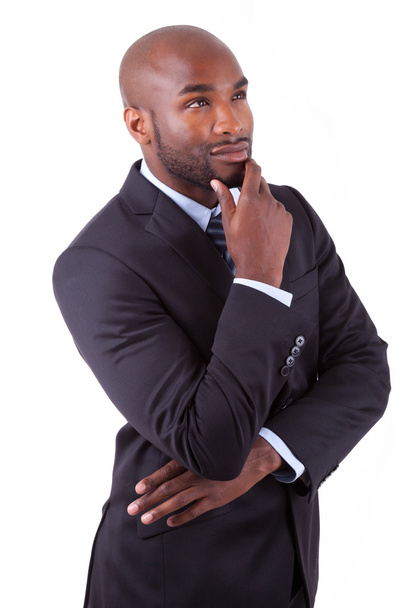 Portrait of a young African American business man thinking - Photo, image