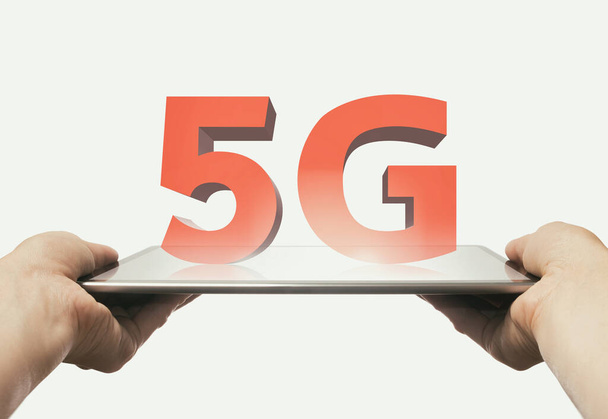 Tablette numérique avec icône 5G. Accès Internet haut débit avec réseau 5G. Isolé sur blanc - Photo, image