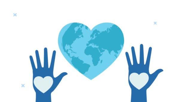 world heart day animation with hands up and earth with heart shape - Footage, Video