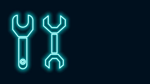 Glowing neon line Spanner icon isolated on black background. 4K Video motion graphic animation - Footage, Video