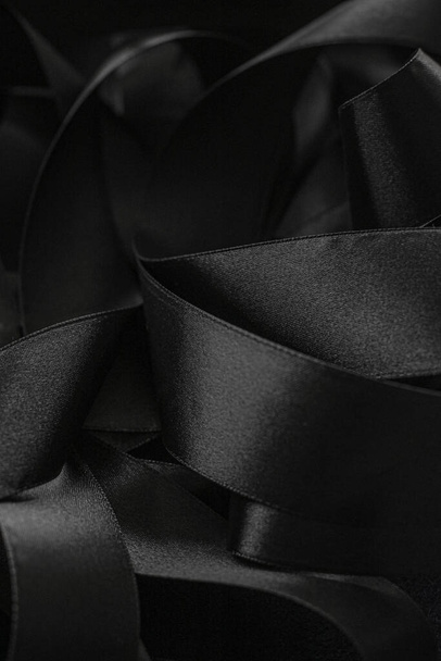 Black silk ribbon as background, abstract and luxury brand design - Фото, зображення
