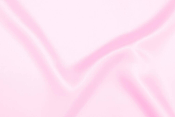 Plastica rosa raso tessuto texture morbida sfocatura sfondo - Foto, immagini