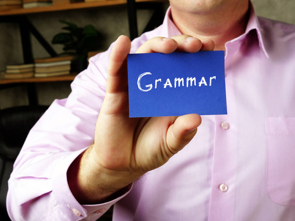 Concepto de negocio que significa Gramática con frase en la hoja - Foto, Imagen