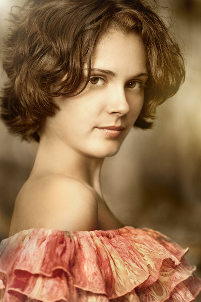 Oldstyle portrait of pretty young woman - Foto, Imagen