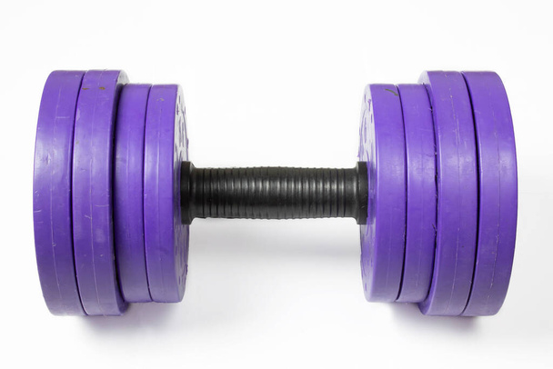 Dumbbell close-up on a white background - Photo, Image