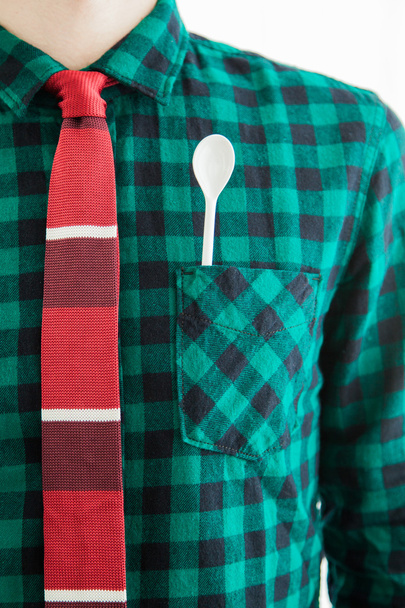 Man with tie and a white spoon in the pocket - Photo, Image