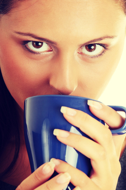 Businesswoman holding coffee cup - Foto, Imagem