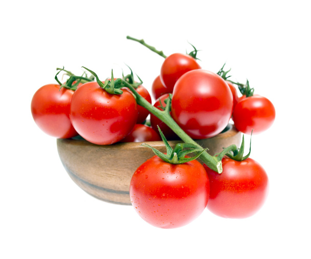 The Branch of Cherry Tomatoes in a Wooden Bowl - Foto, afbeelding