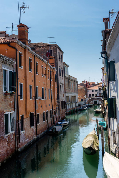Italy, Venice, a narrow canal in a city - 写真・画像