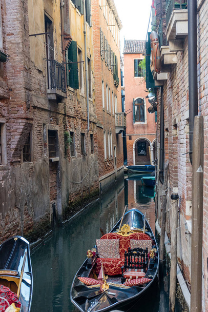 the gondolas parked along the canal in Venice, Italy - Photo, Image