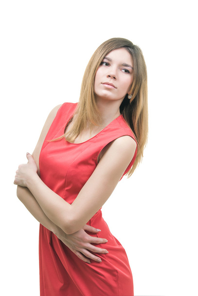 Young girl in a red dress on a white background - Foto, Bild