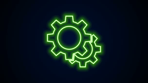Ragyogó neon vonal Gear ikon elszigetelt fekete háttérrel. A fogaskerék sebességfokozat-beállító jele. Fogaskerék szimbólum. 4K Videó mozgás grafikus animáció - Felvétel, videó