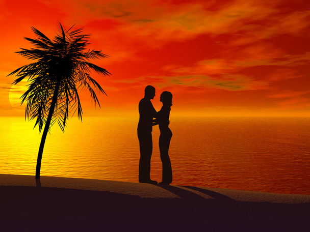 ένα ζευγάρι που αγκαλιάζουν μεταξύ τους στο ηλιοβασίλεμα. - Φωτογραφία, εικόνα