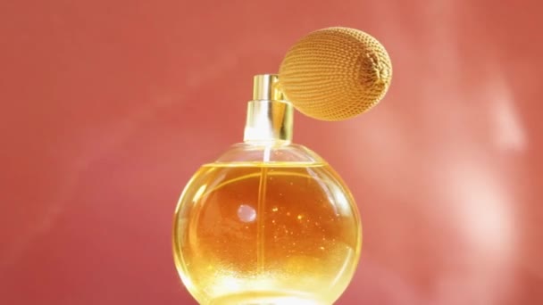 Golden perfume bottle and shining light flares, chic fragrance scent as luxury product for cosmetic and beauty brand  - Footage, Video