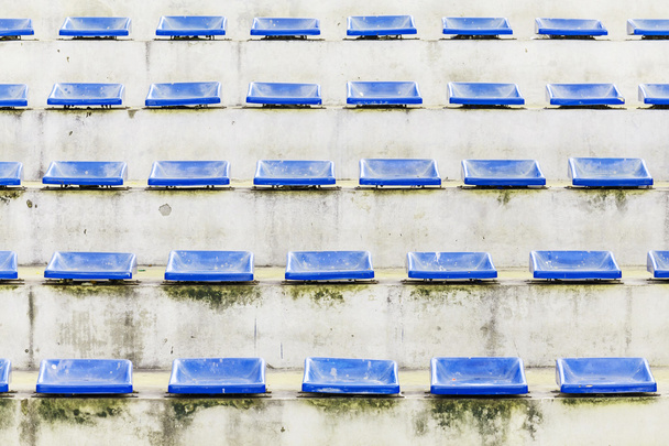 old grandstand arena with blue chair - Photo, Image