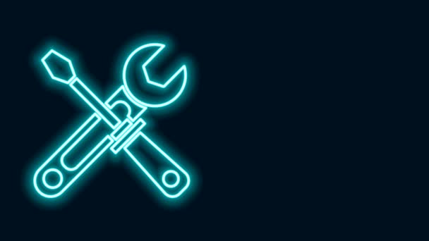Leuchtende Neon-Linie Schraubenzieher und Schraubenschlüssel Werkzeuge Symbol isoliert auf schwarzem Hintergrund. Service-Tool-Symbol. 4K Video Motion Grafik Animation - Filmmaterial, Video