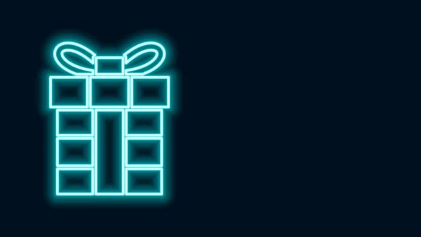Linha de néon brilhante Ícone da caixa de presente isolado no fundo preto. Feliz Natal e Feliz Ano Novo. Animação gráfica em movimento de vídeo 4K - Filmagem, Vídeo