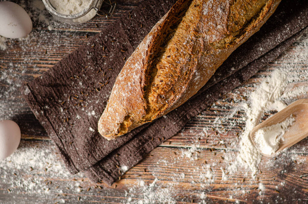 Delicious homemade whole grain baguette with seeds - Φωτογραφία, εικόνα