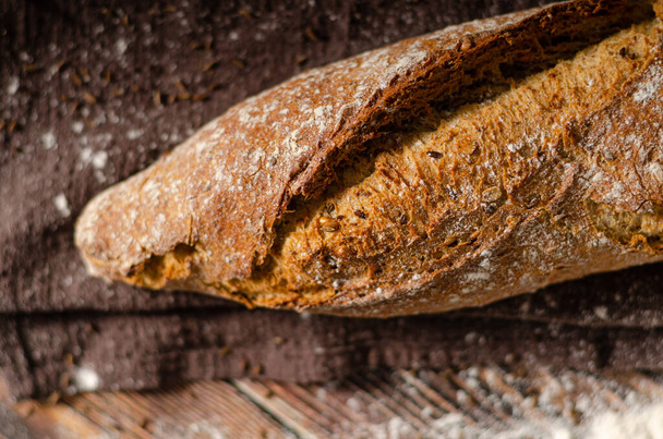 Delicious homemade whole grain baguette with seeds - Fotoğraf, Görsel