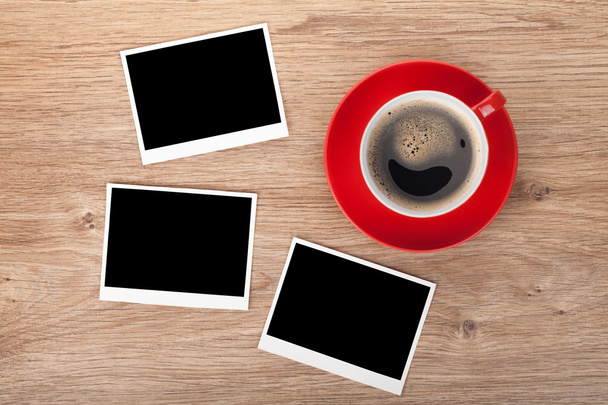 Cup of coffee and three photo frames - Foto, imagen