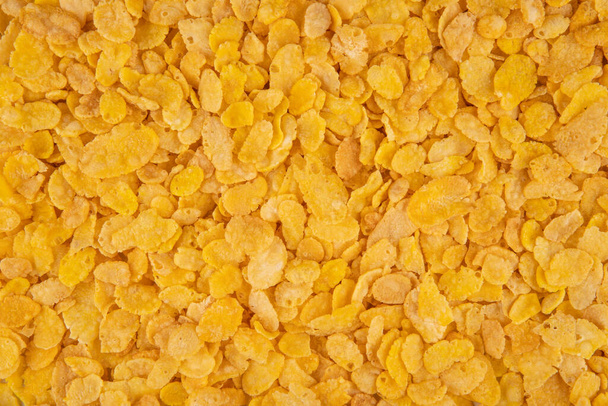 Corn flakes texture - top view and corn flakes closeup - Photo, Image