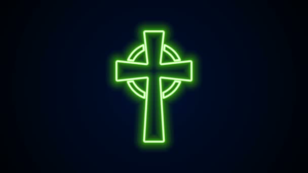 Glowing neon line Tombstone with cross icon isolated on black background. Grave icon. 4K Video motion graphic animation - Footage, Video