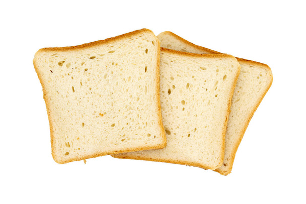 Drie geroosterde brood plakjes voor het ontbijt geïsoleerd op een witte achtergrond - Foto, afbeelding