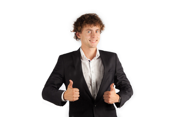 Studio shot of business man showing thumbs up sign - Фото, изображение