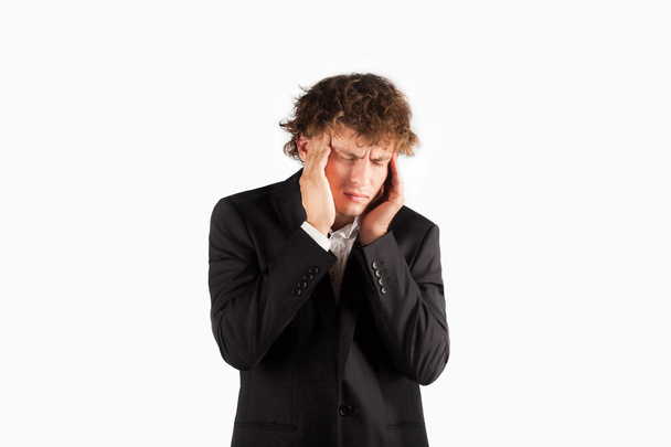 young businessman scratching his head, hard decision, studio sho - Foto, Bild
