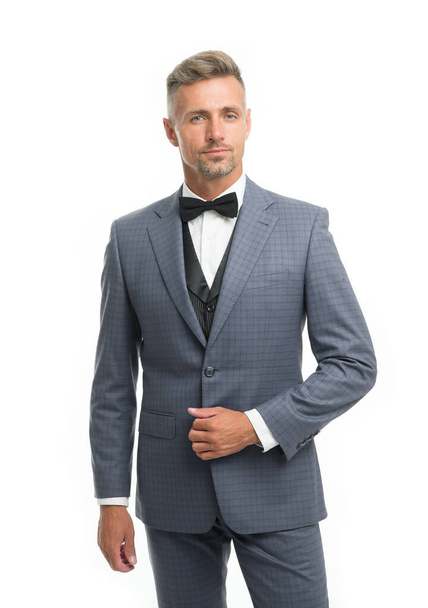 Tailored suit. Menswear concept. Guy well groomed handsome macho wear black tuxedo. Groom fashion trend. Fashion clothes. Modern trend. Rent suit service. Elegant outfit. Gentleman fashion style - Photo, image