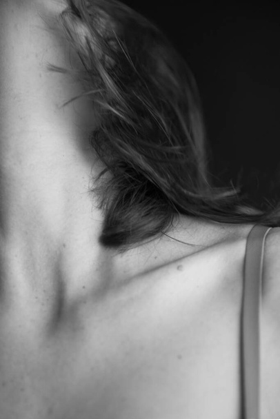 Details of body black and white portrait of beautiful girl, fashion and art - Photo, Image