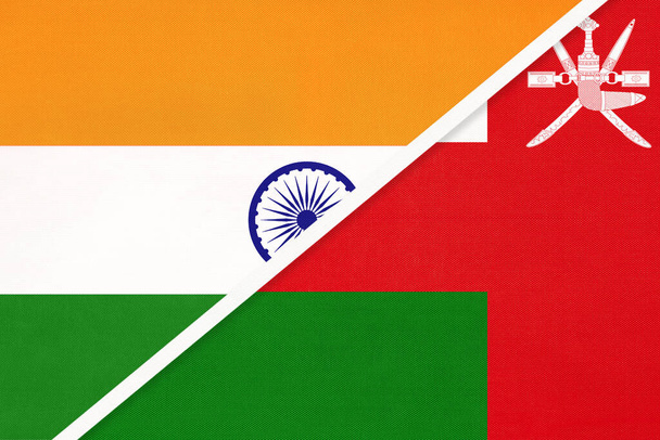 India and Sultanate of Oman, symbol of national flags from textile. Relationship, partnership and championship between Asian countries. - Foto, Bild