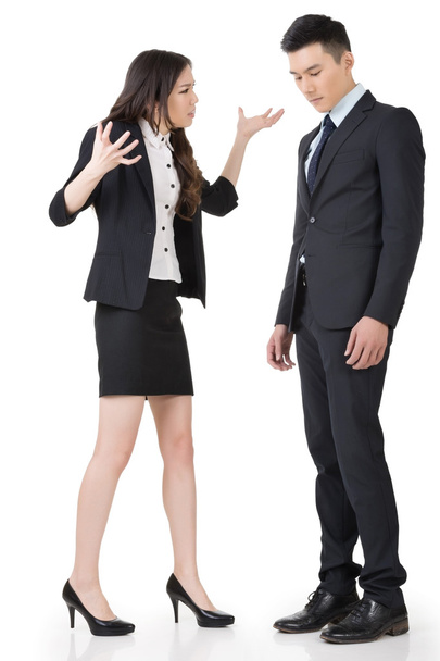 Angry business woman yelling to a man - Photo, Image