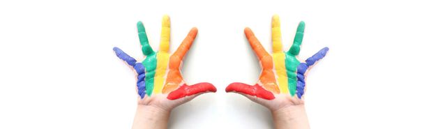 Rainbow painted hand shape isolated on white. Hand painted rainbow, painted rainbow and open paints - Foto, imagen