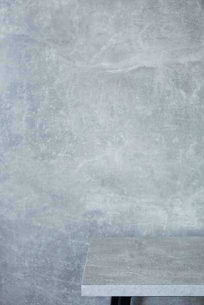 wooden table and grey wall background texture surface - Valokuva, kuva